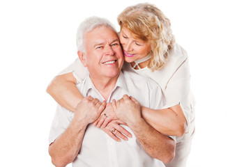 Happy smiling senior couple in love. Isolated over white