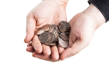 stack of coins and human hand