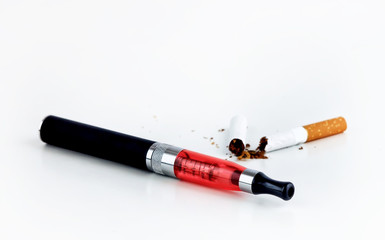 Electronic cigarette and broken cigarette on white background