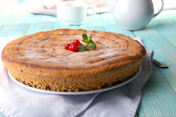 Tasty homemade pie on table