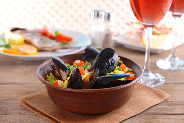 Seafood Paella on plate on table close-up