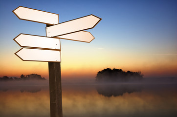 Guidepost on a lakeshore