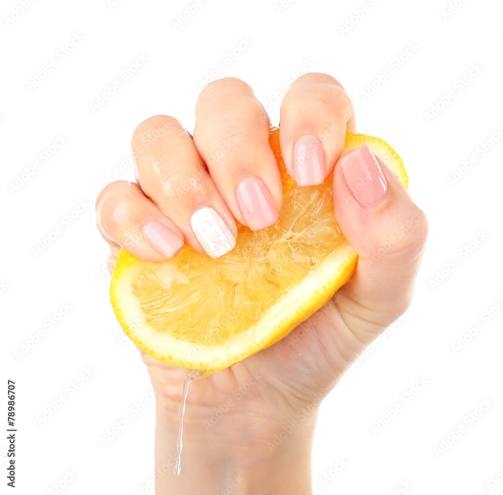 Poster Female hand squeezing lemon isolated on white