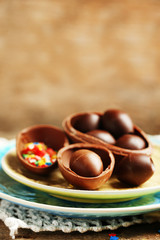 Chocolate Easter Eggs on wooden background
