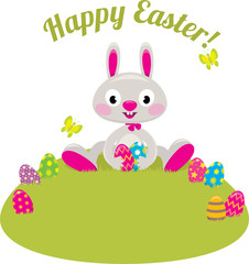 Easter bunny and colored eggs in the grass