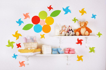 Obraz premium Baby accessories on shelves close-up