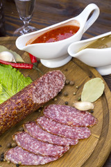 sausage on a wooden plate in a restaurant