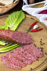 sausage on a wooden plate in a restaurant