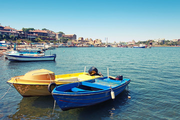 Fototapeta na wymiar Small fishing boats moored in Nessebar town, Bulgaria