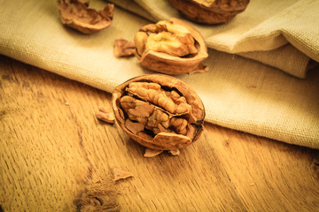 walnuts on rustic old wooden table