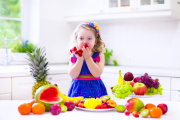 Little girl eating water melon