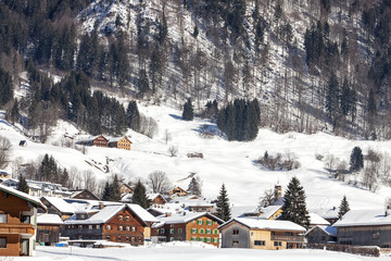 Fototapeta premium Alpine village in the snow