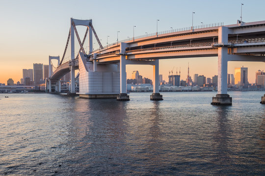 Sunset at Rainbow bridge with Tokyo tower in background