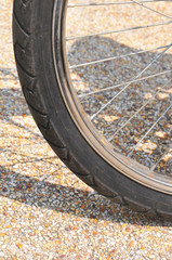 part of the wheel from the bicycle.