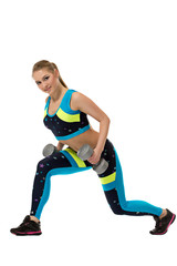 Fototapeta na wymiar Energetic girl actively exercising with dumbbells