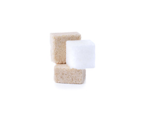 Brown cane sugar cubes on white background