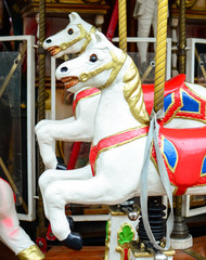 Fototapeta na wymiar Carousel - Fair conceptual background with horses
