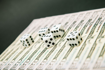 American dollars and dice