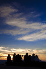 Group of People Sitting in Front of the Edge of Increadible Bryc