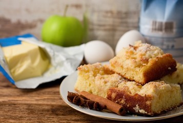 Plate with several portions of apple cake and spice