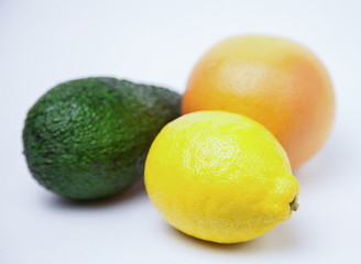 Ripe tropical fruits on white background
