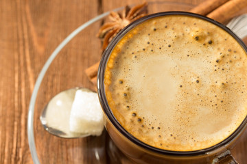 cup of coffee on wood