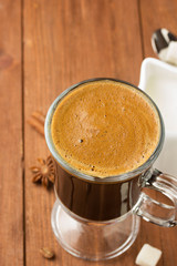 cup of coffee on wood