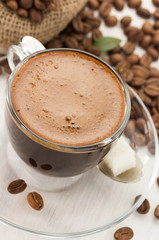 cup of coffee on wood