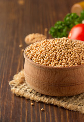 mustard spices on wood