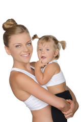 mother with her daughter in clothes for sport