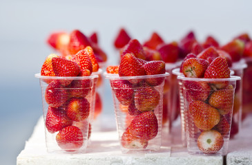 trawberries in plastic cup