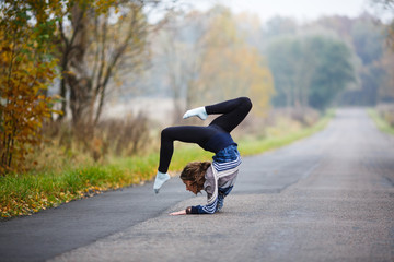 Young girl makes splits