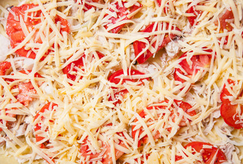 Raw pizza with vegetables