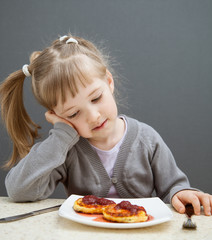 The girl doesn't want to eat