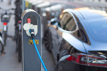 Electric Car in Charging Station.