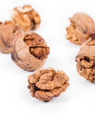 Heap of cracked walnuts.