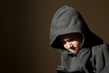 Sad upset tired worried little child (boy)