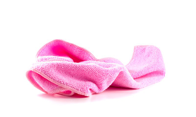 Lump pink towel on a white background