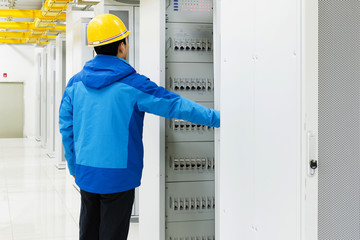 worker checking in the Telecommunication room © hxdyl