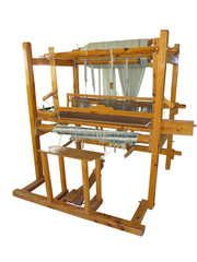 Vintage ancient wooden loom isolated over white