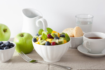 fruit salad with mango kiwi blueberry for breakfast