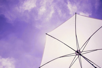 sun umbrella in blue sky