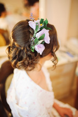 Obraz na płótnie Canvas a bride with flowers in her hair