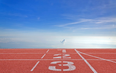running track number standard red color under the blue sky.