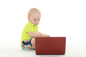 Baby boy with laptop.