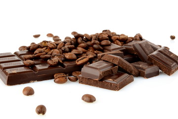 Studio shot of chocolates and beans of coffee