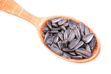 Sunflower seeds in a spoon