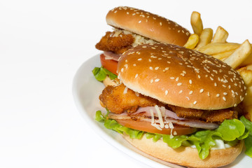 Big hamburger with chicken and french fries