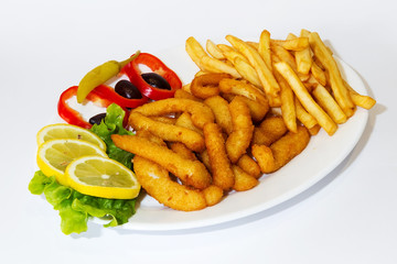 Fried squid rings with french fries and lettuce