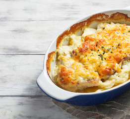 Baked meat with potatoes and cheese